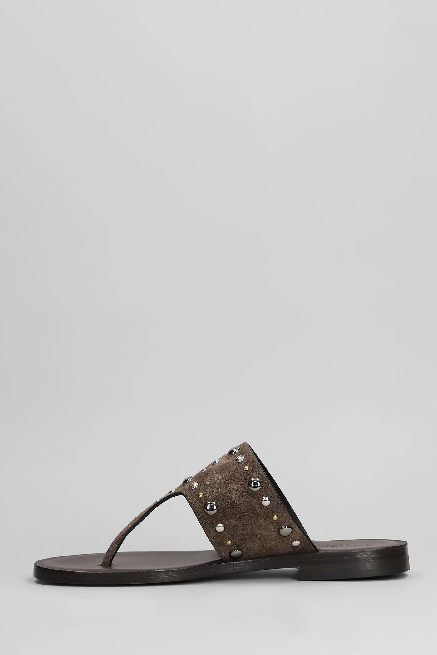 Flats in brown suede