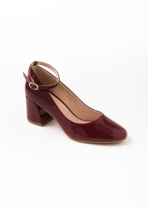 Patent pumps with ankle strap heel