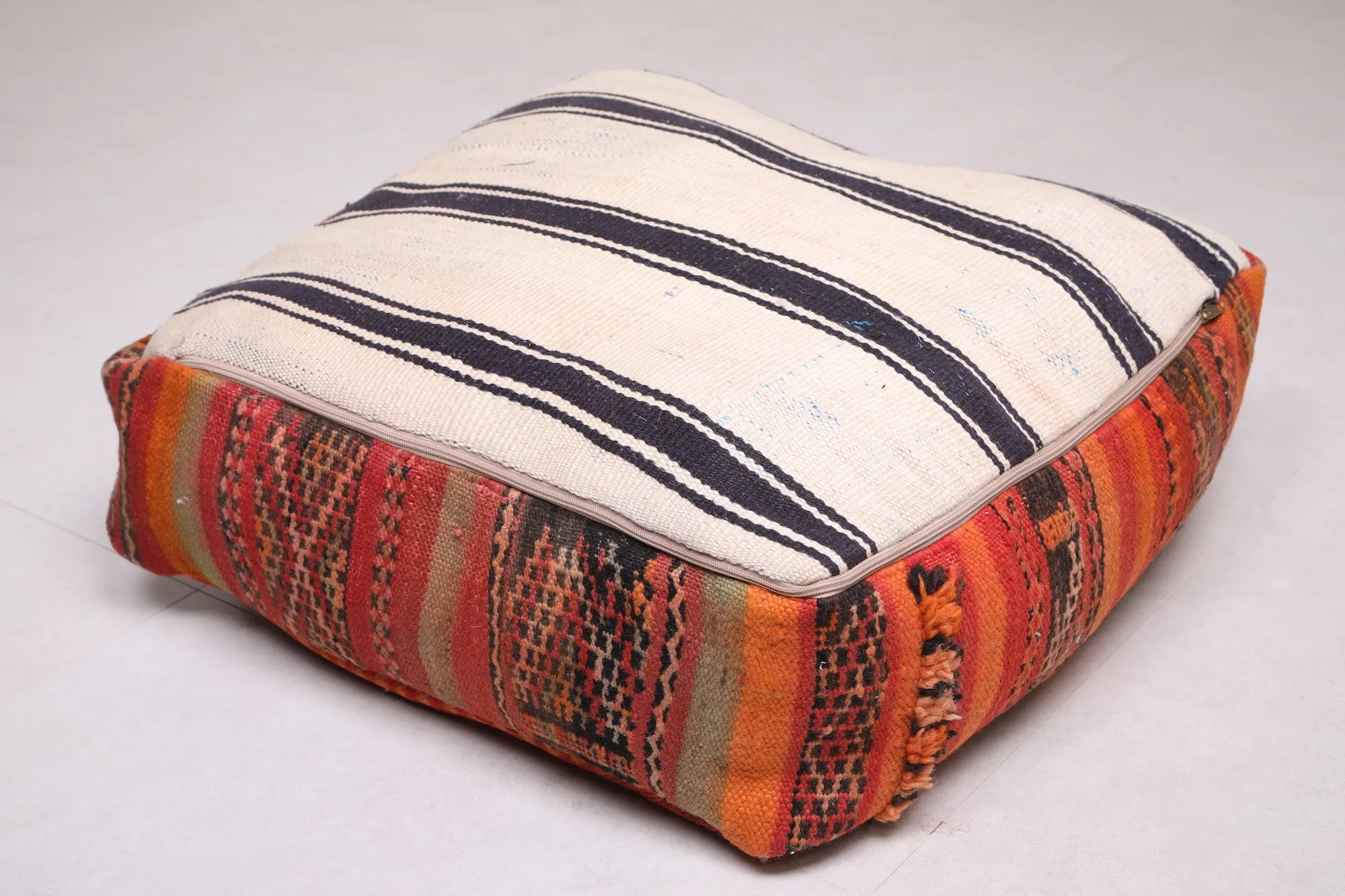 Two ottoman Moroccan woven rug poufs