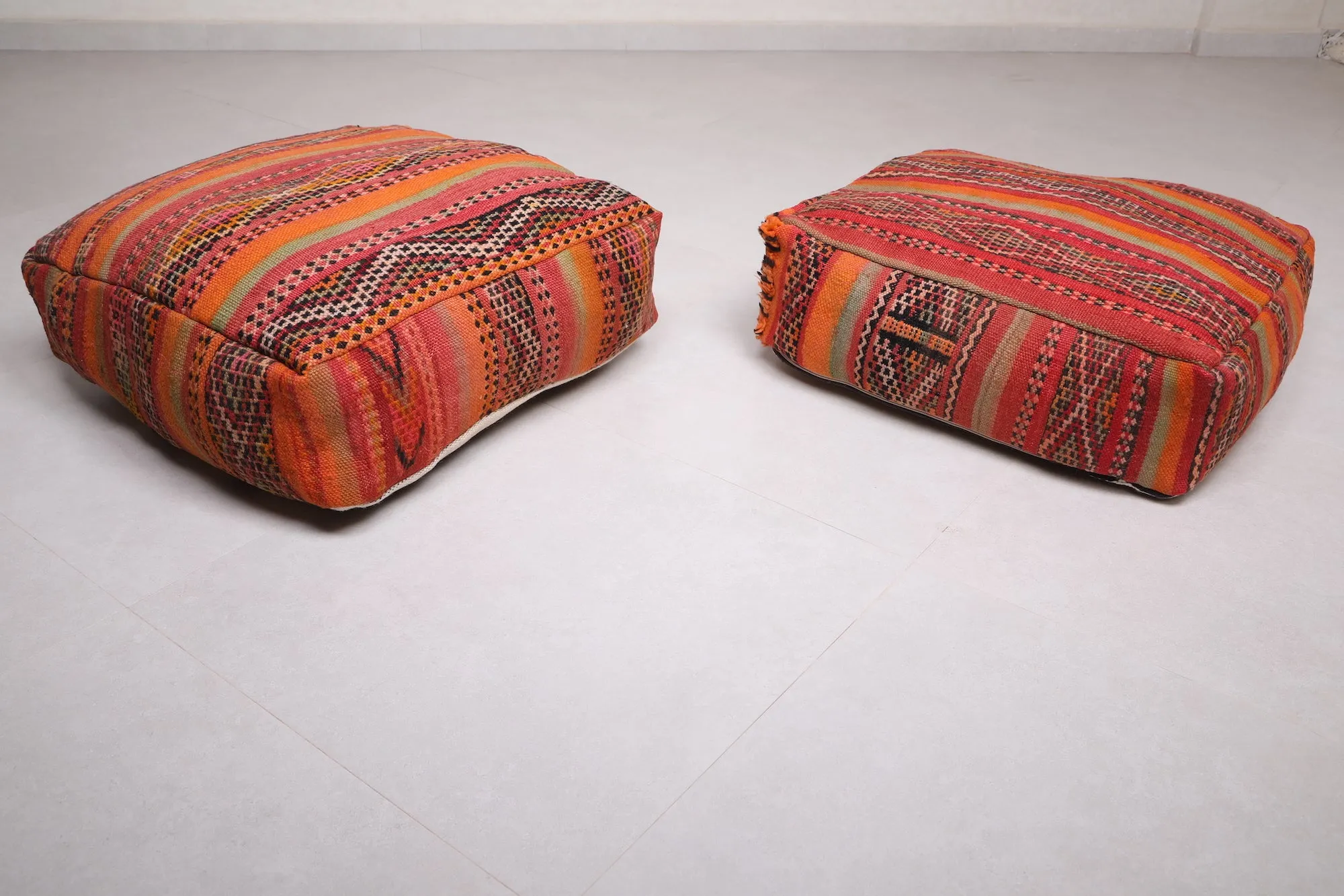 Two ottoman Moroccan woven rug poufs