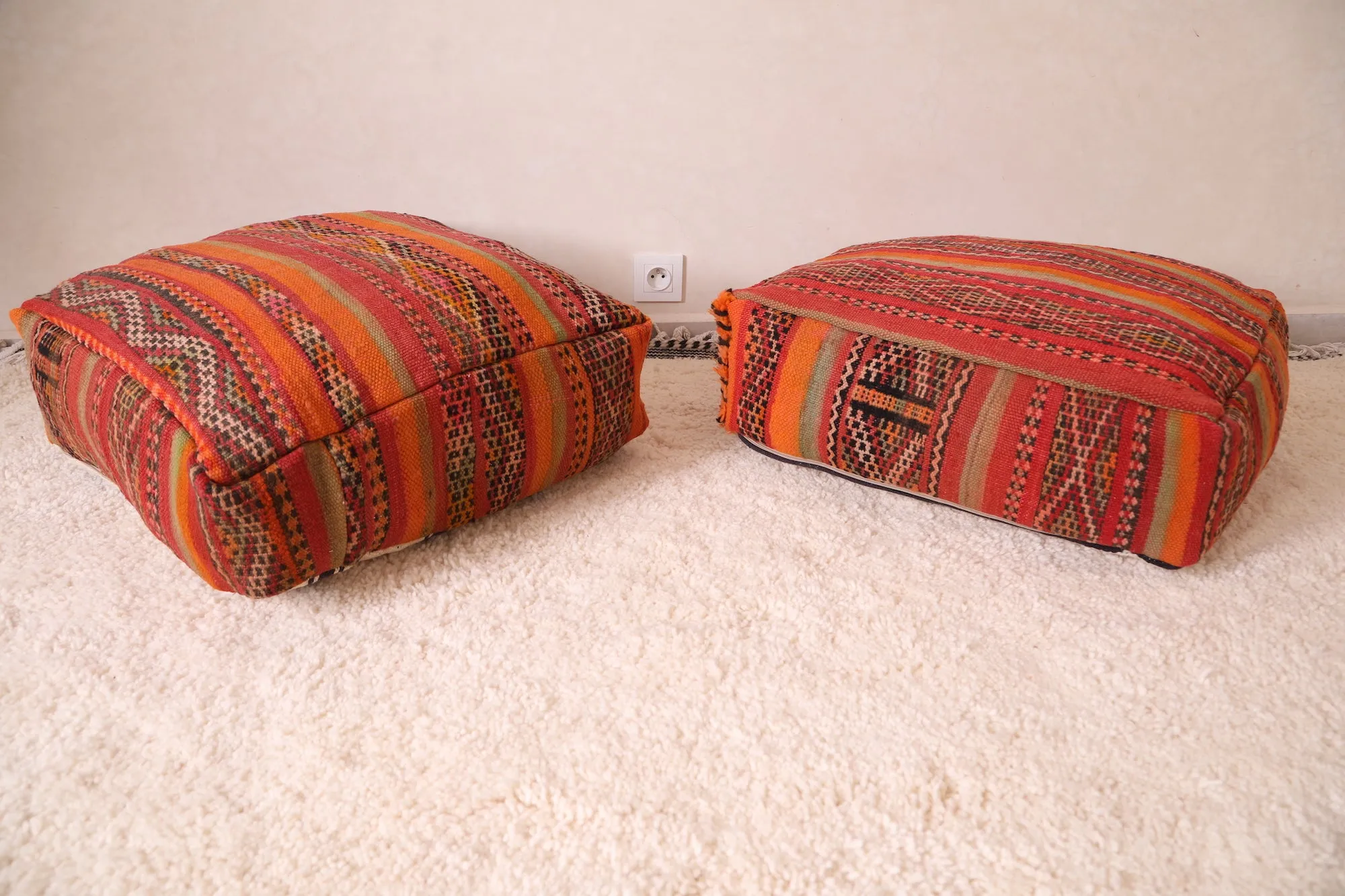 Two ottoman Moroccan woven rug poufs