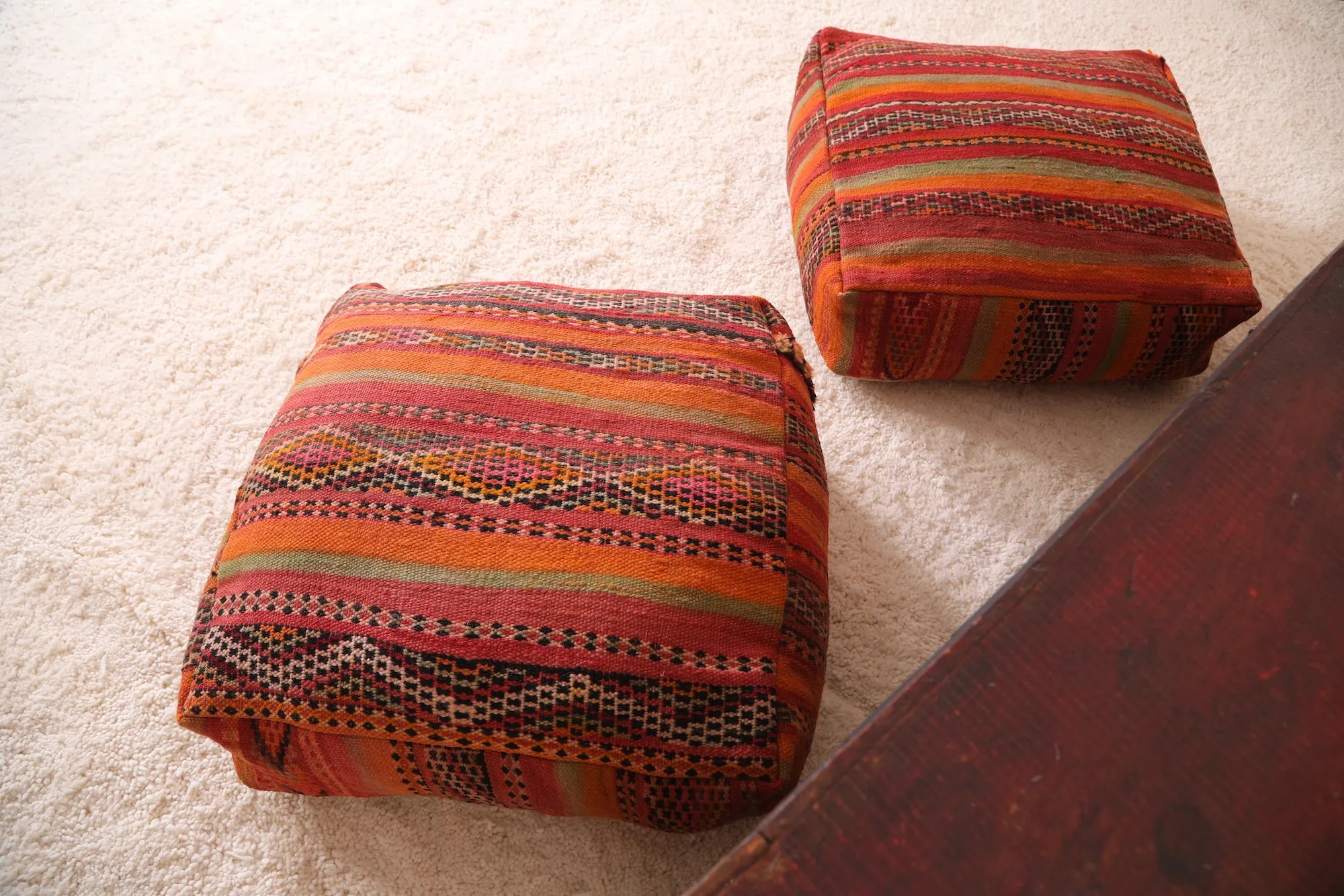 Two ottoman Moroccan woven rug poufs